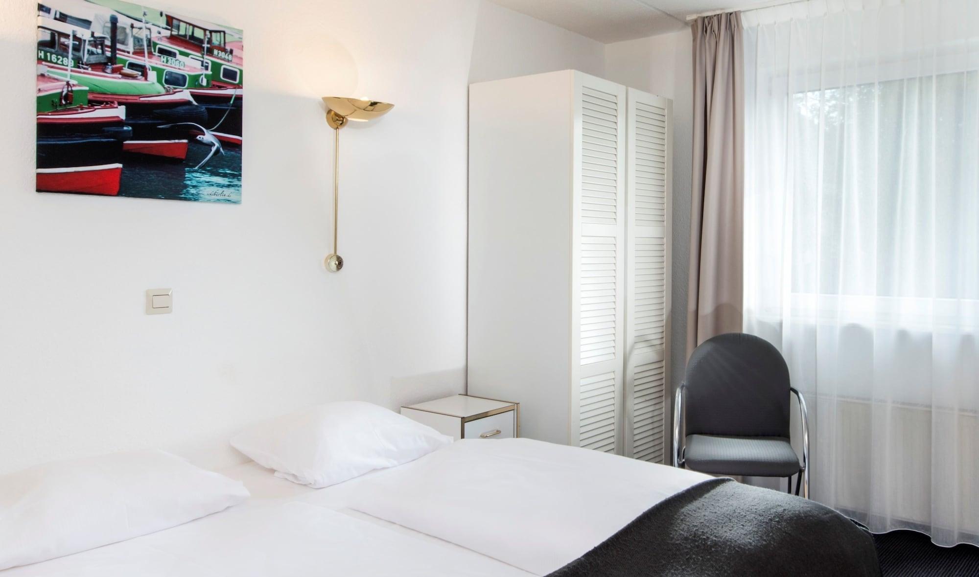 City Inn Hotel Lipsko Pokoj fotografie