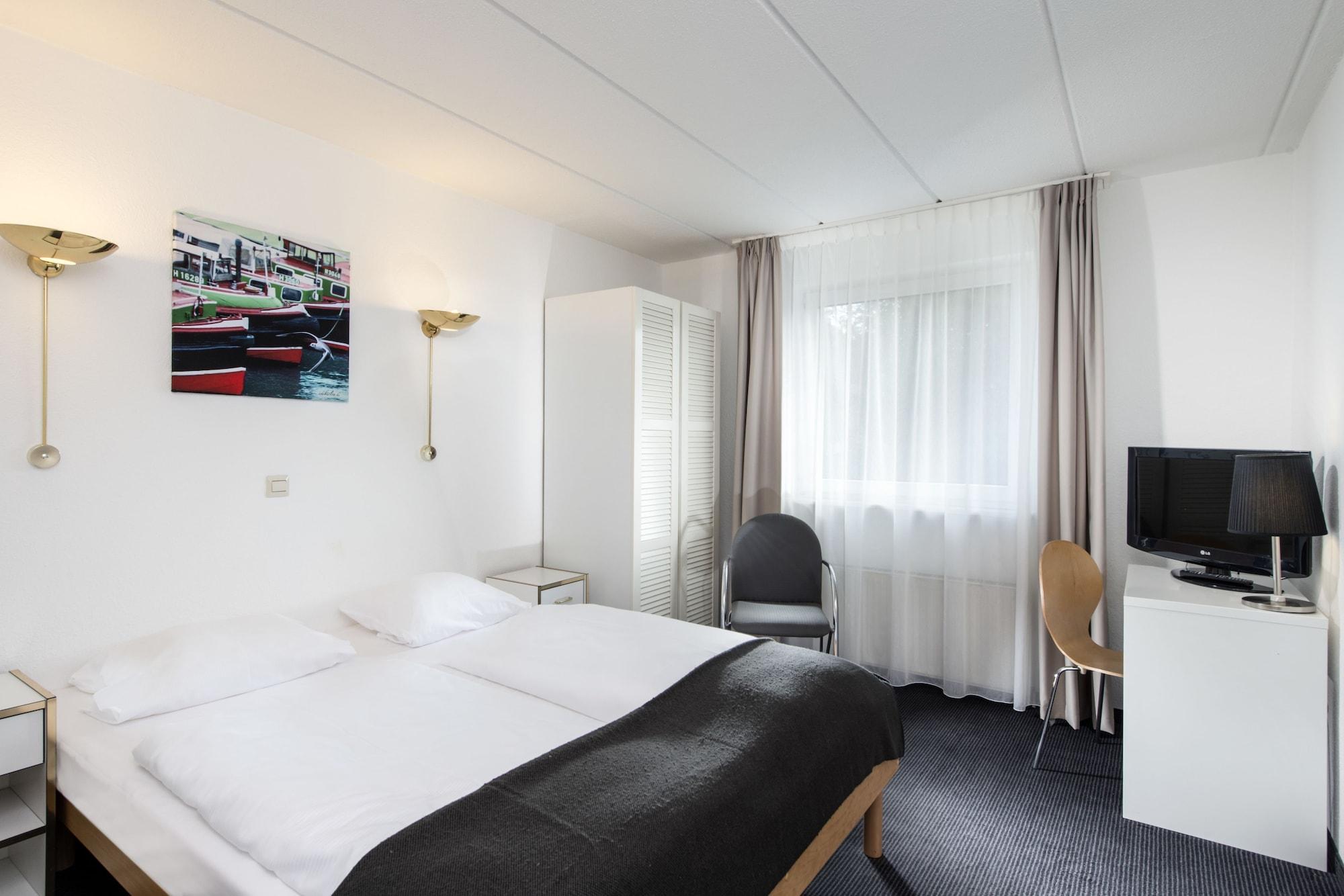 City Inn Hotel Lipsko Pokoj fotografie