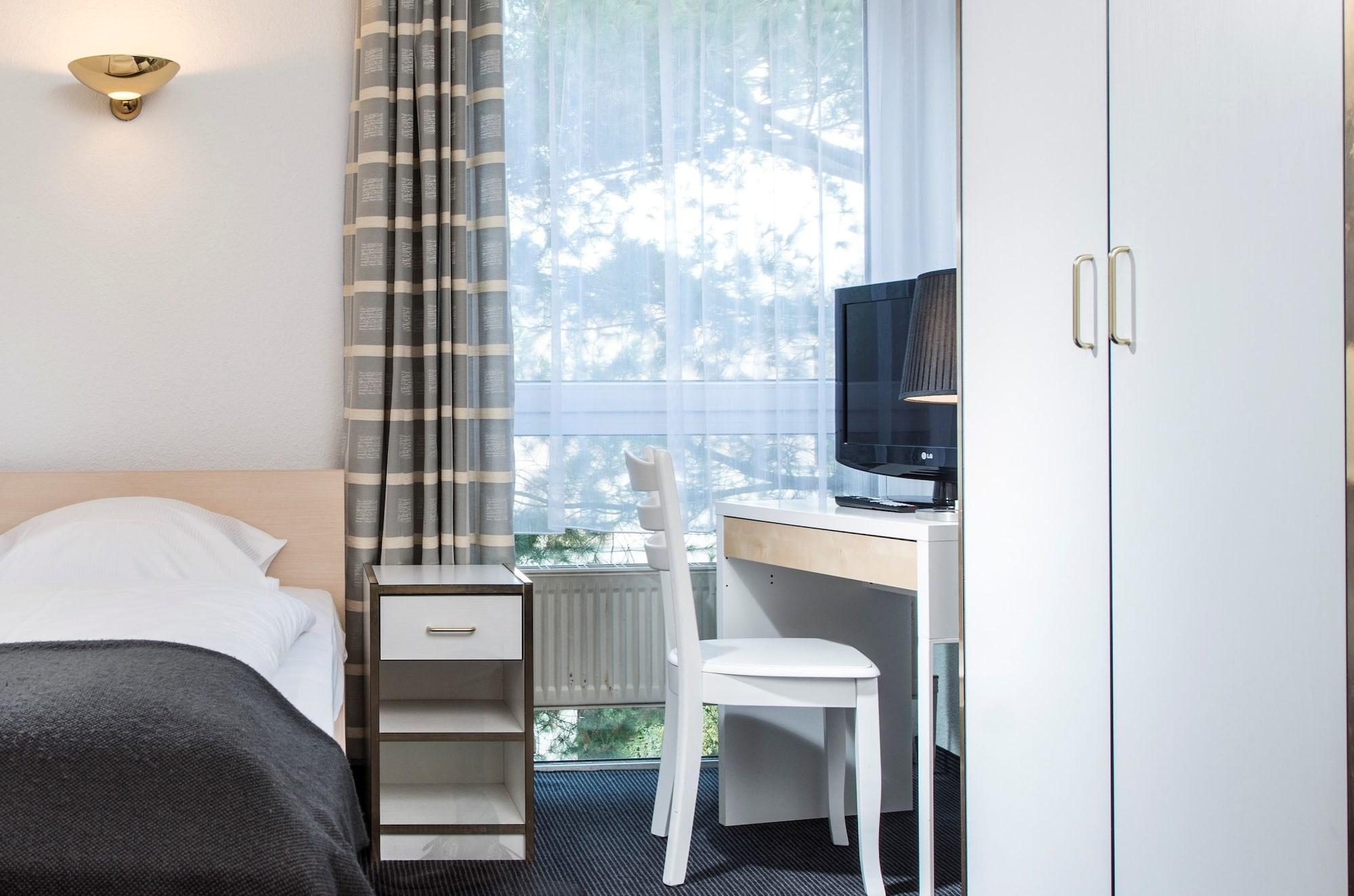 City Inn Hotel Lipsko Pokoj fotografie
