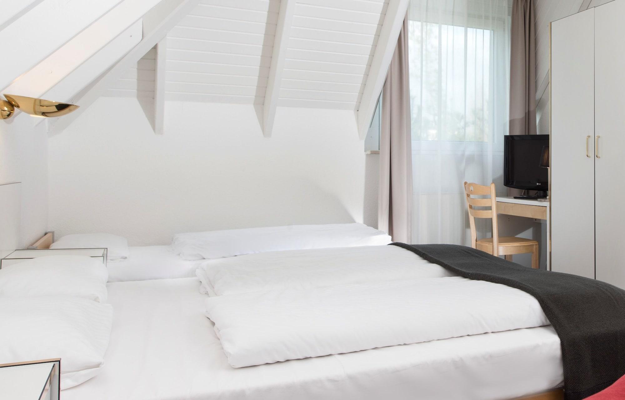 City Inn Hotel Lipsko Pokoj fotografie