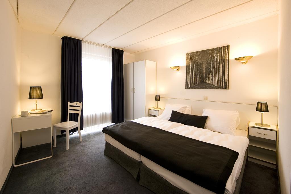 City Inn Hotel Lipsko Pokoj fotografie