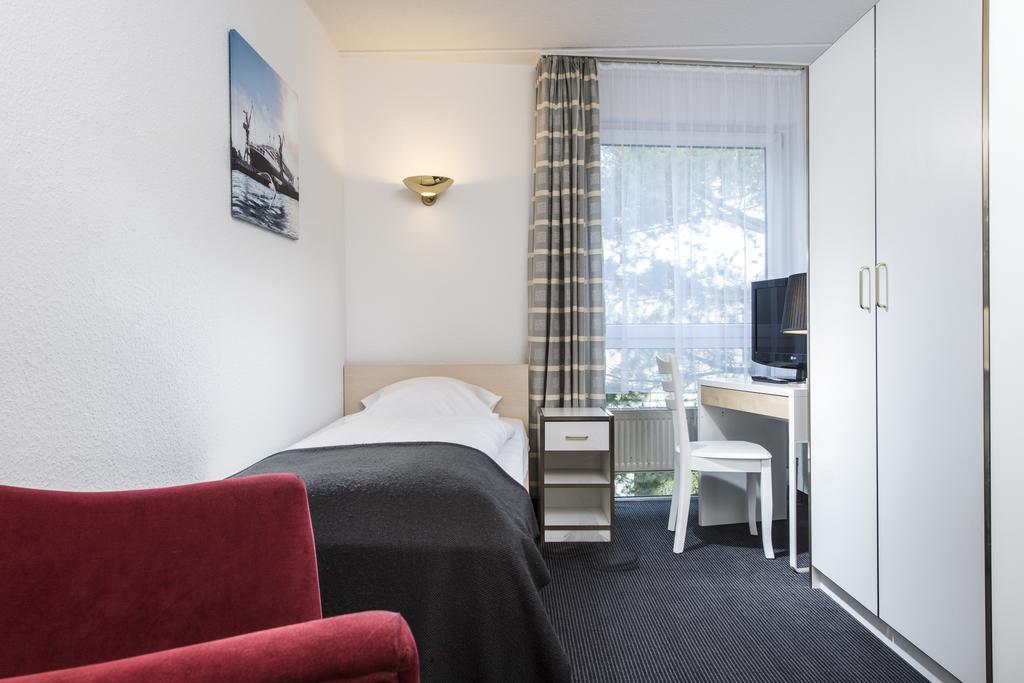 City Inn Hotel Lipsko Pokoj fotografie
